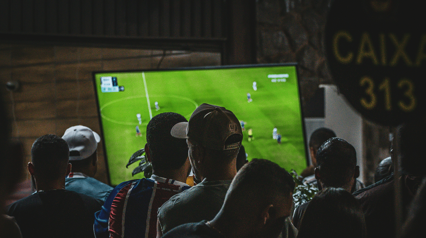 Smartphone with a live football match broadcast via broadcasting software.